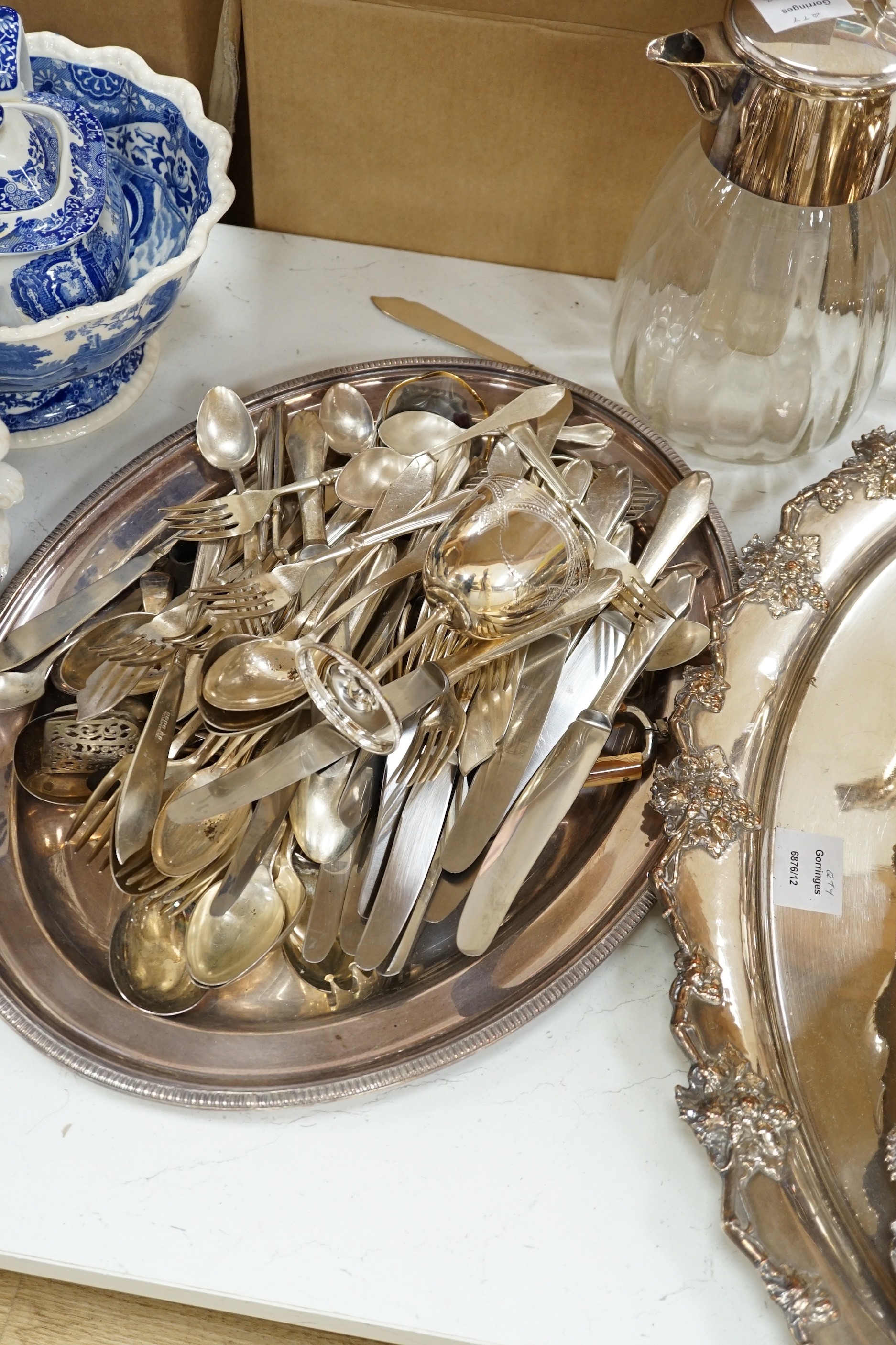 A large Victorian oval plated two handled tea tray, a smaller two handled tray and other plated wares (a quantity)